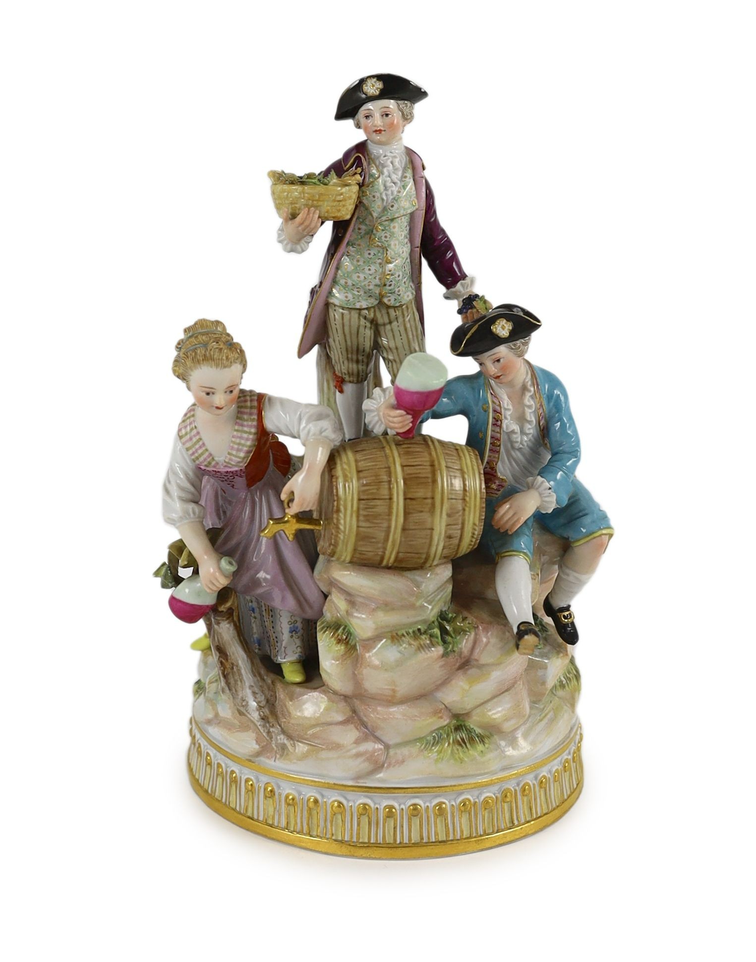 A Meissen group of the three winemakers, 19th century, after a model by Michel Victor Acier, 21 cm high